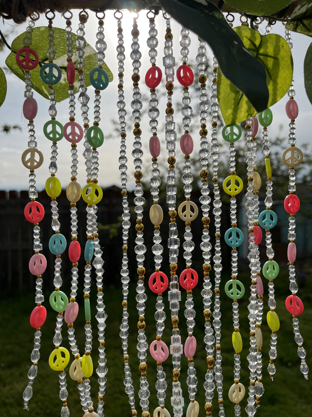 Glass tree of peace sun catcher