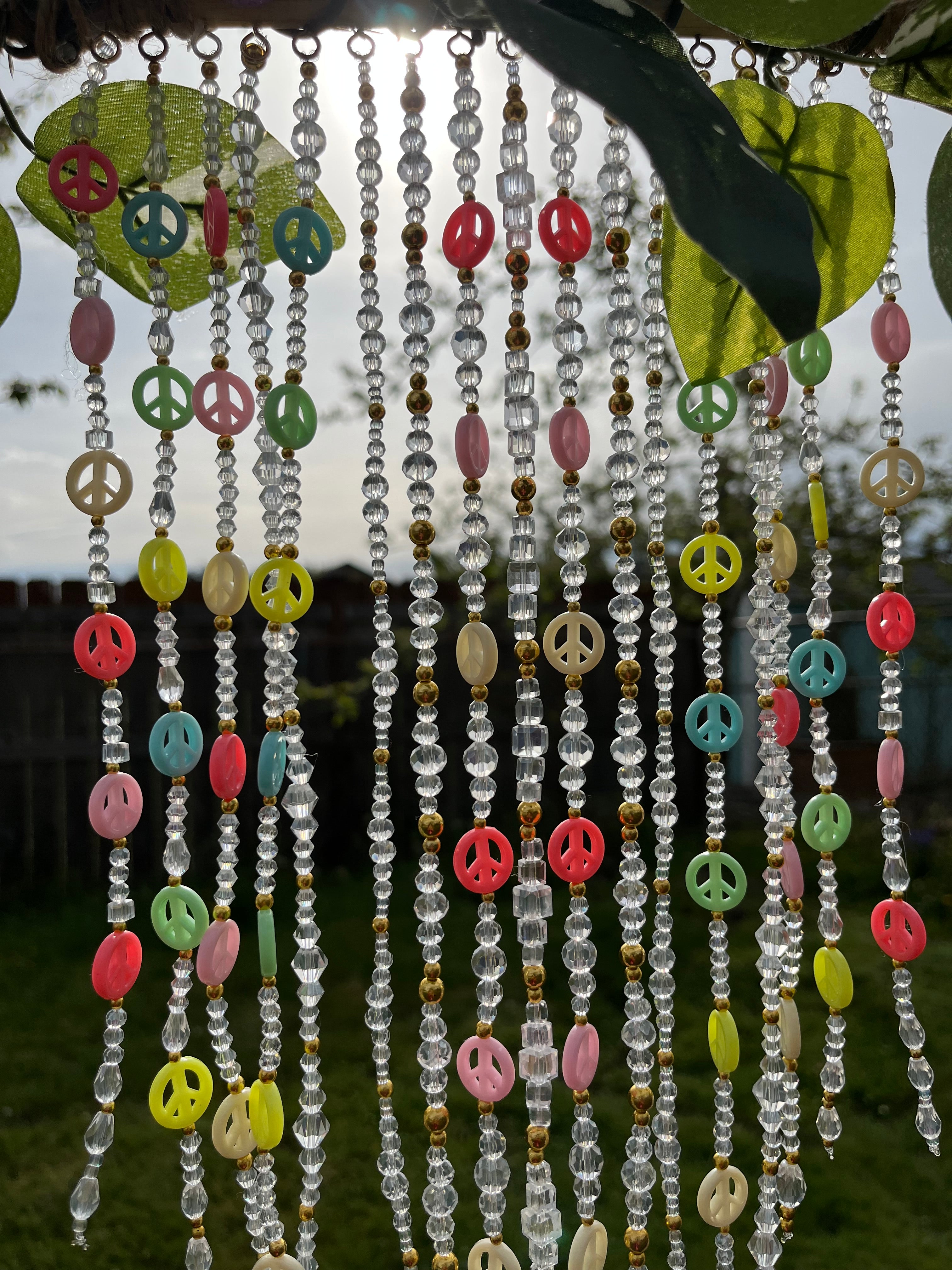 Glass tree of peace sun catcher