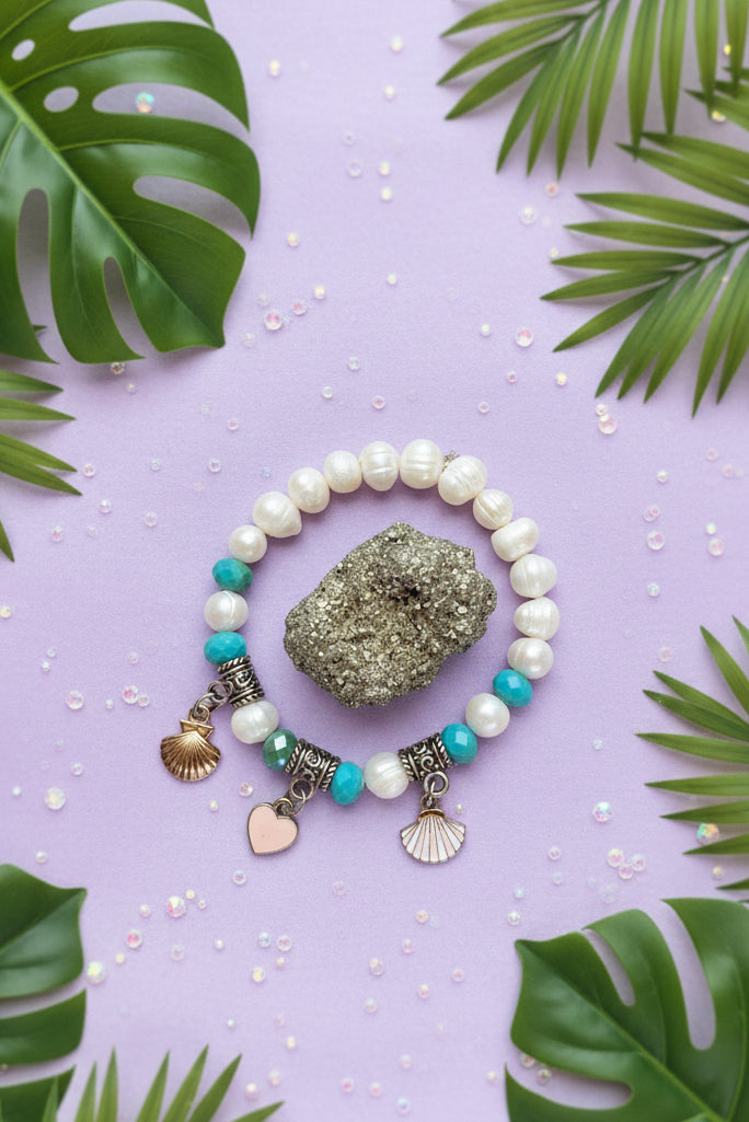 Beachy pearl bracelet with charms