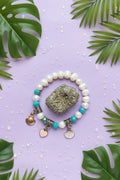 Beachy pearl bracelet with charms