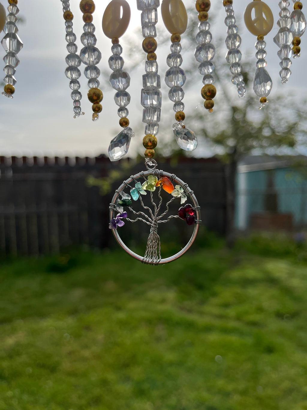 Glass tree of peace sun catcher