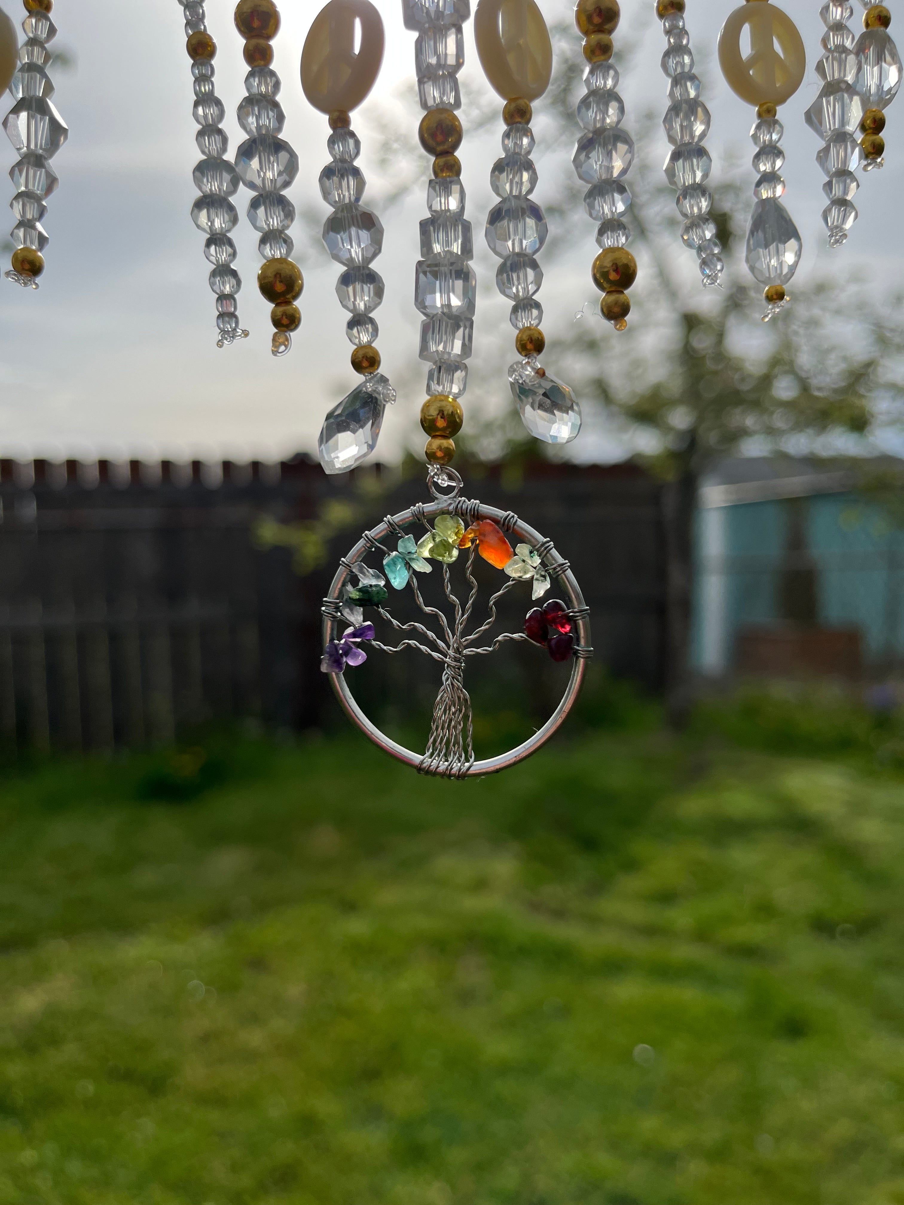 Glass tree of peace sun catcher