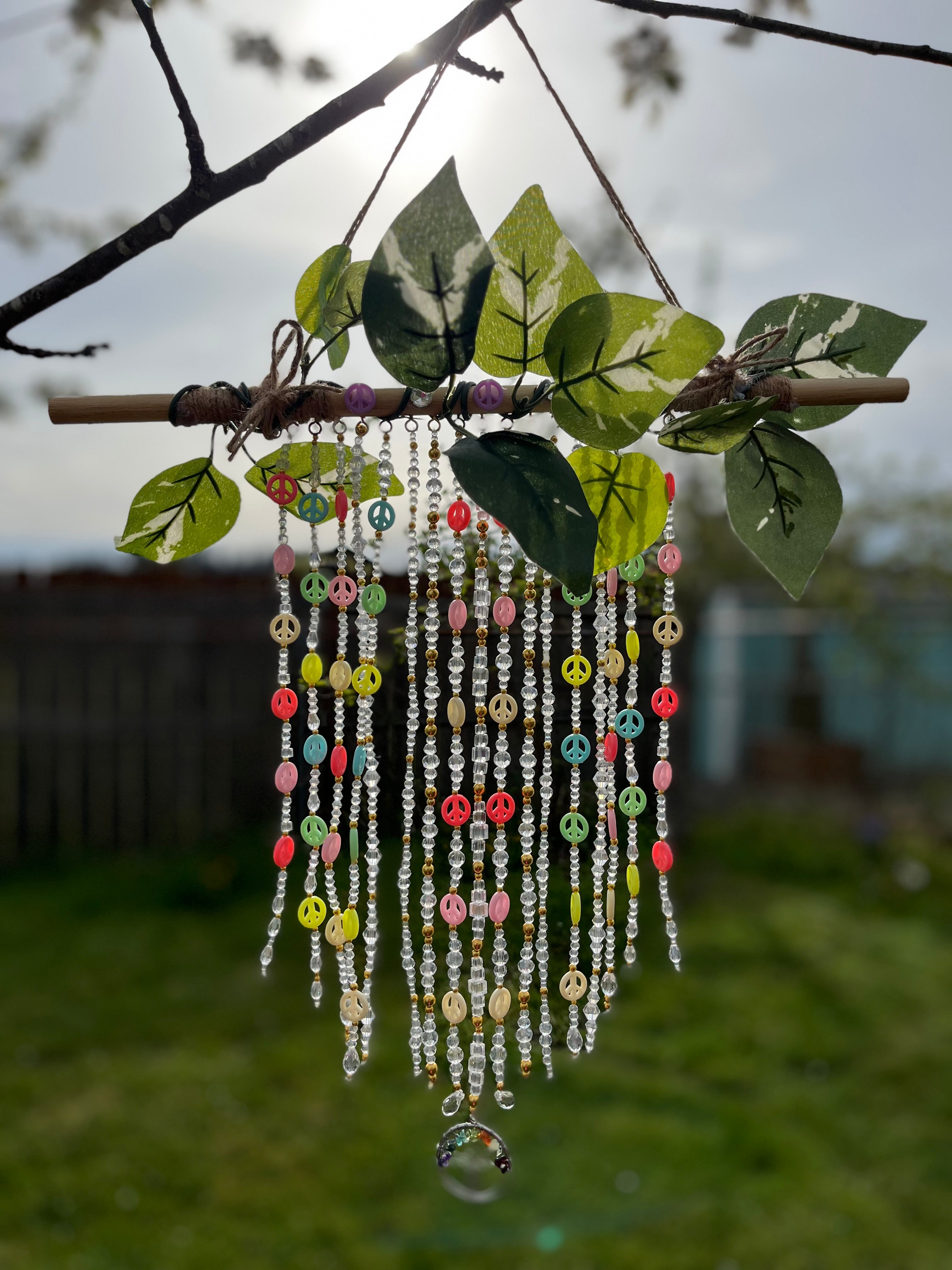 Glass tree of peace sun catcher
