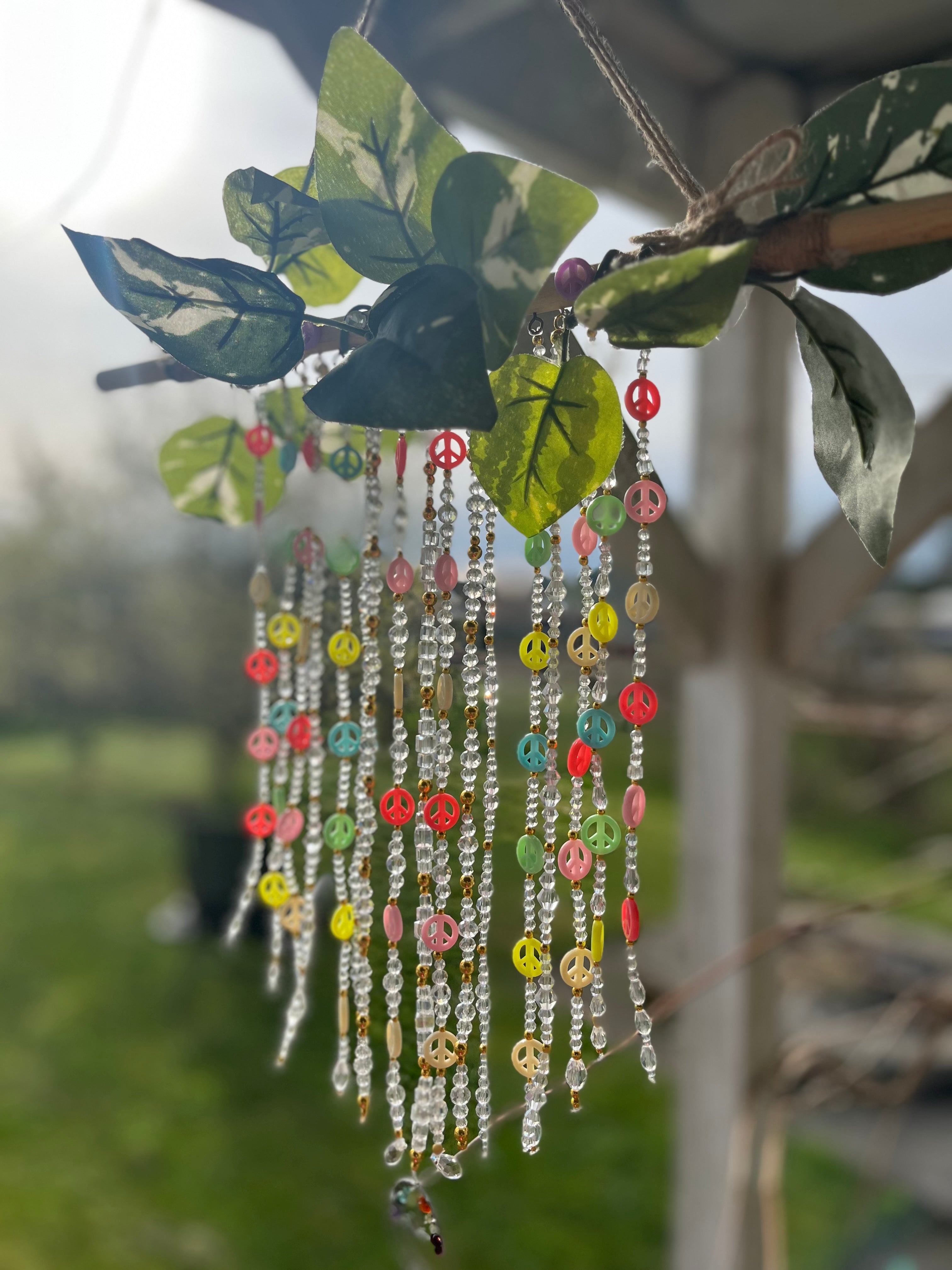 Glass tree of peace sun catcher